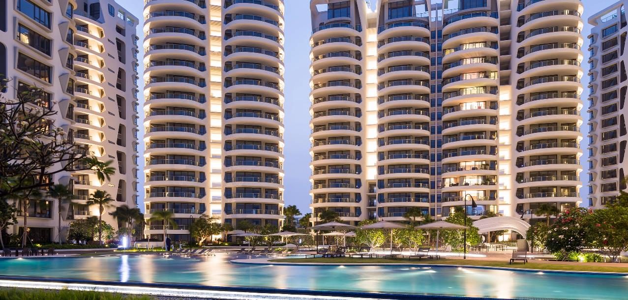 Cape Royale towers and pool at dusk